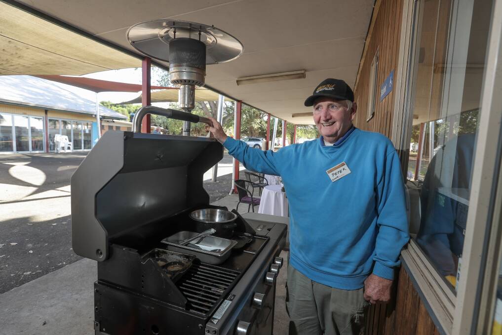HAPPY TO HELP: Peter Goodall, from Barnawatha, gets the barbecue going every morning and ensures no BlazeAid volunteers go to work on an empty stomach. Picture: Rob Gunstone