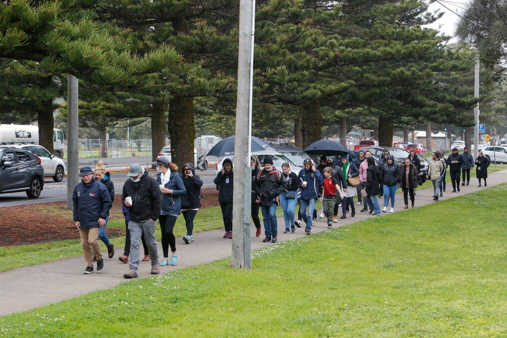 RALLY: A crowd heads towards the breakwater on Saturday to protest against mandatory vaccinations for authorised workers. Picture: Anthony Brady