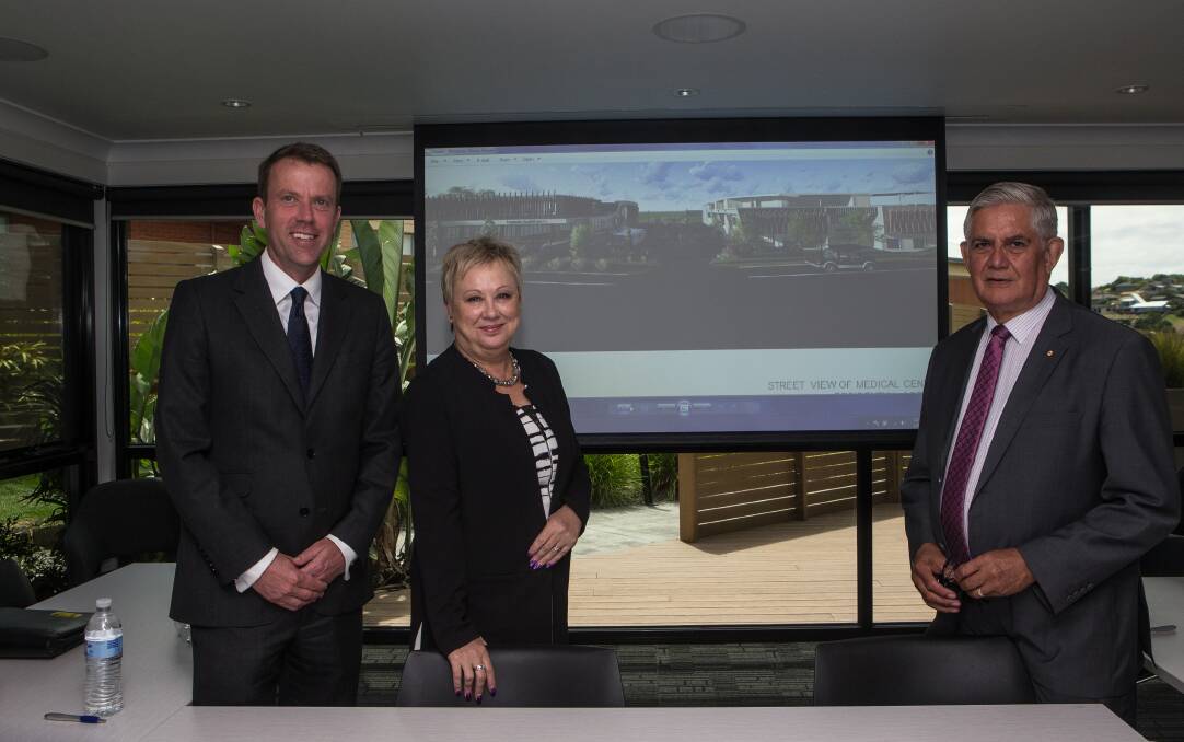 FUTURE PLANS: Member for Wannon Dan Tehan, Lyndoch Living CEO Doreen Power and the Minister for Aged Care Ken Wyatt look at plans for the aged care provider. Picture: Christine Ansorge