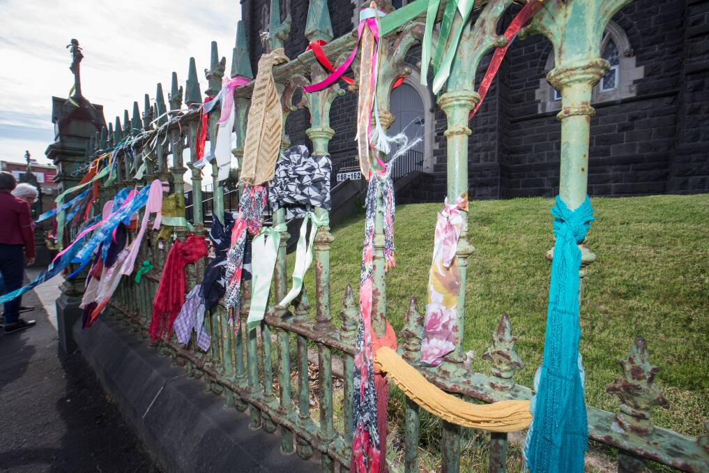 BELIEVED: The fence of St Joseph's church in Warrnambool was adorned with hundreds of colourful ribbons to acknowledge the suffering of victims of childhood sexual abuse in 2019 ahead of Cardinal George Pell's sentencing.