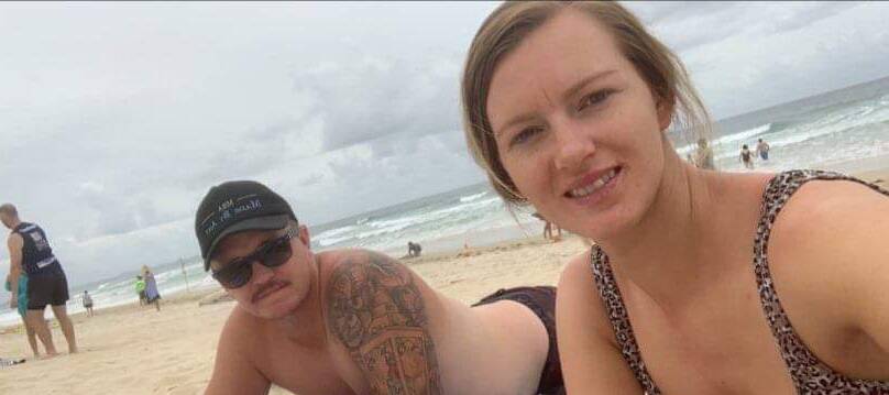 HOME SAFE: Anthony and Rebecca Mitchell on holiday at Surfers Paradise before they had to cut their holiday short. Picture: Supplied