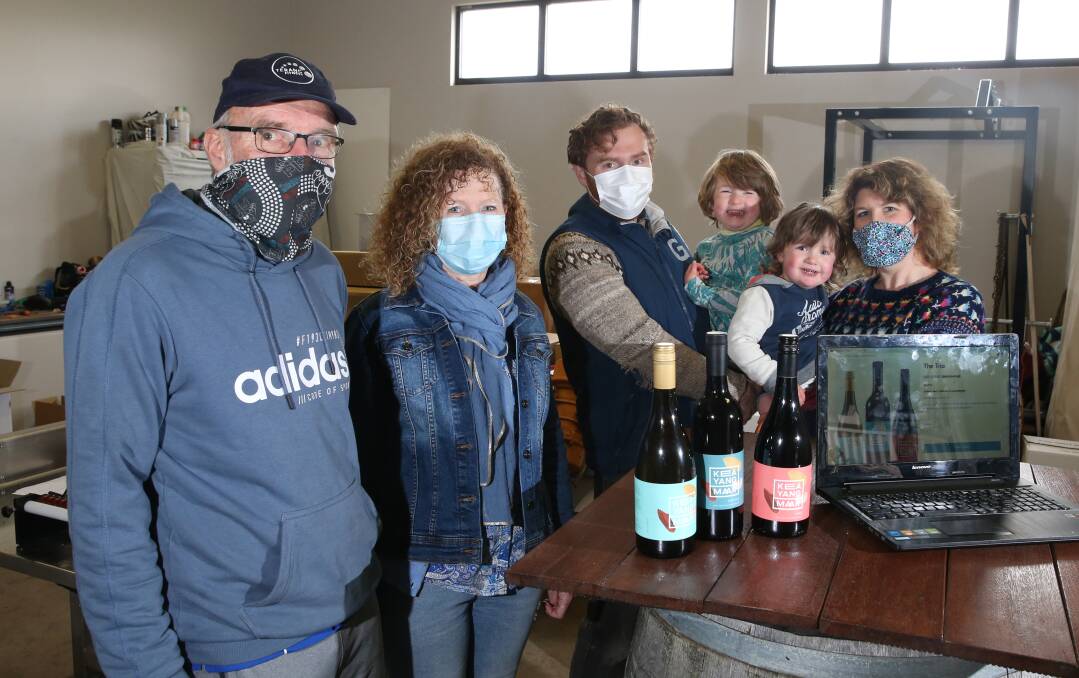 FAMILY AFFAIR: Keayang Maar vineyard owners Barry and Bernadette Wurlod, with their son Jerram and daughter-in-law Caitlin and children Archie, 3, (left) and Wren, 2,(right) launched their wine sales online over the weekend. Picture: Mark Witte