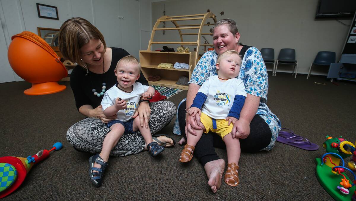 CHEEKY: Ahead of World Down Syndrome Day on Tuesday Jayne Brumby with son Eli, 2, and Sharon Reeve with son Hugo, 1, say their bright and bubbly boys are typical toddlers. Photo: Amy Paton