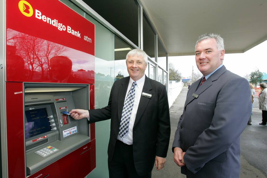 STILL GOING: Trevor Gardner-Chairman of Cobden and District Community Bank Branch Bendigo Bank and manager Peter Hall pictured in 2008. 