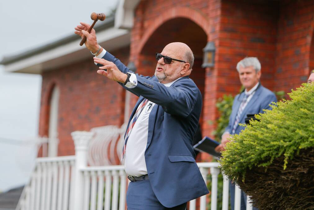 SOLD: Auctioneer Bruce Ludeman calls the auction at Hotham Street in Warrnambool. Picture: Anthony Brady
