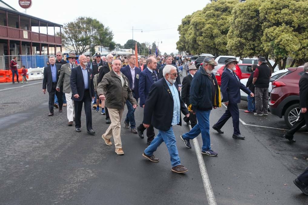 REMEMBRANCE: Returned service men and women march in Port Fairy on Anzac Day in 2018, services will return to towns around the south-west after the pandemic meant they couldn't be held in 2020. Picture: Morgan Hancock