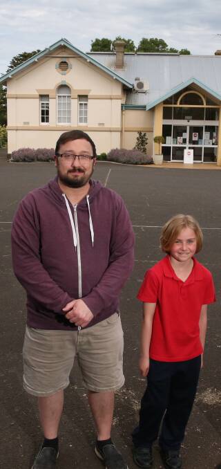 WELCOME: Hampden Specialist school leading teacher Paul Lyons and student Abigail Allwood-Gouros, 9, were pleased with the funding announcement.