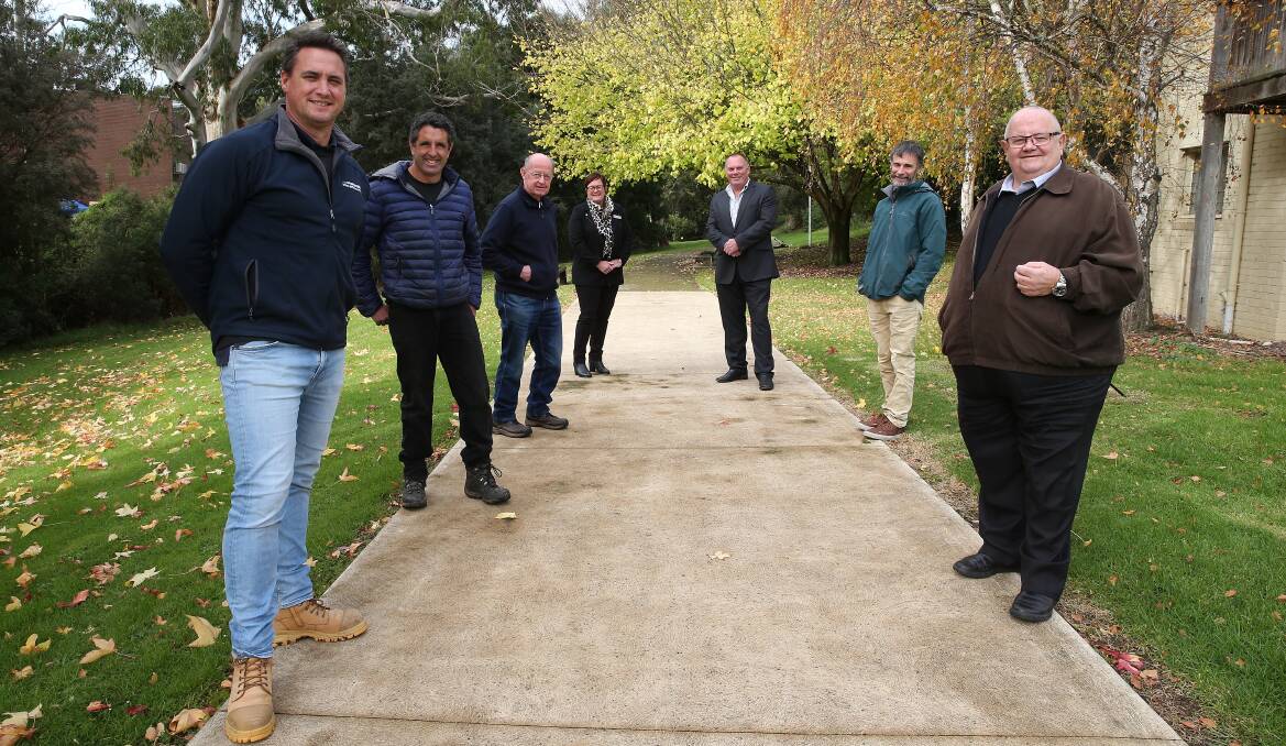 FINALLY: Trail committee members David Pope, Matthew Bowker, Alan Kerr, Corangamite shire's Brooke Love, councillor Simon Illingworth, committee member Mark Cuthell and mayor Neil Trotter. Picture: Mark Witte