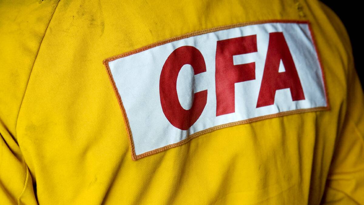 UNDER CONTROL: CFA crews are continuing to work on board a livestock carrier at the Port of Portland.