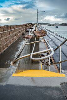 DAMAGE: Warrnambool City Council has temporarily closed the Warrnambool breakwater and boat ramp after wild weather on the weekend cause significant damage. Picture: Rodney Harris Photography 