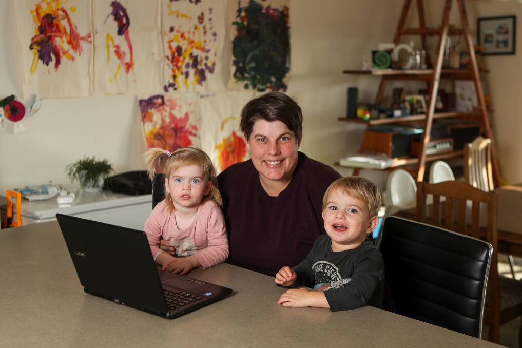 HANDSFULL: Cherie Geyer is a teacher at the Special Developmental School and is working remotely with her two-year-old twins Quinn Geyer-Fox and Owen Geyer-Fox. Picture: Morgan Hancock 
