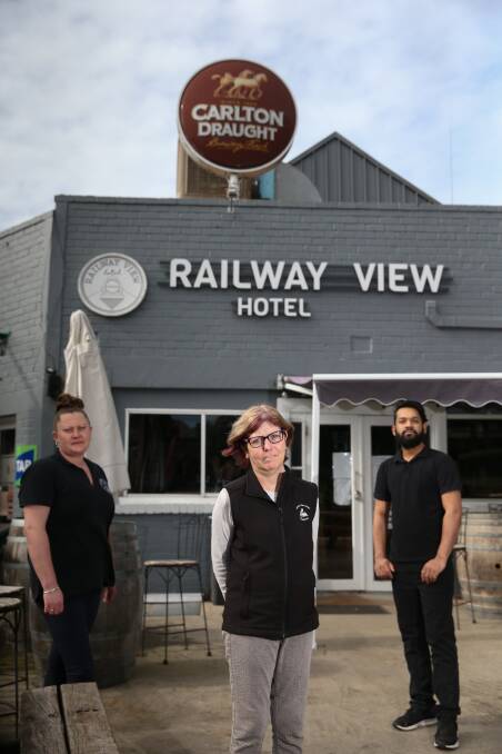GRATEFUL: Timboon Hotel worker Sheree Johnstone, owner Karen Flett and chef Mo are doing takeaway lunch and dinners seven days a week. Picture: Mark Witte