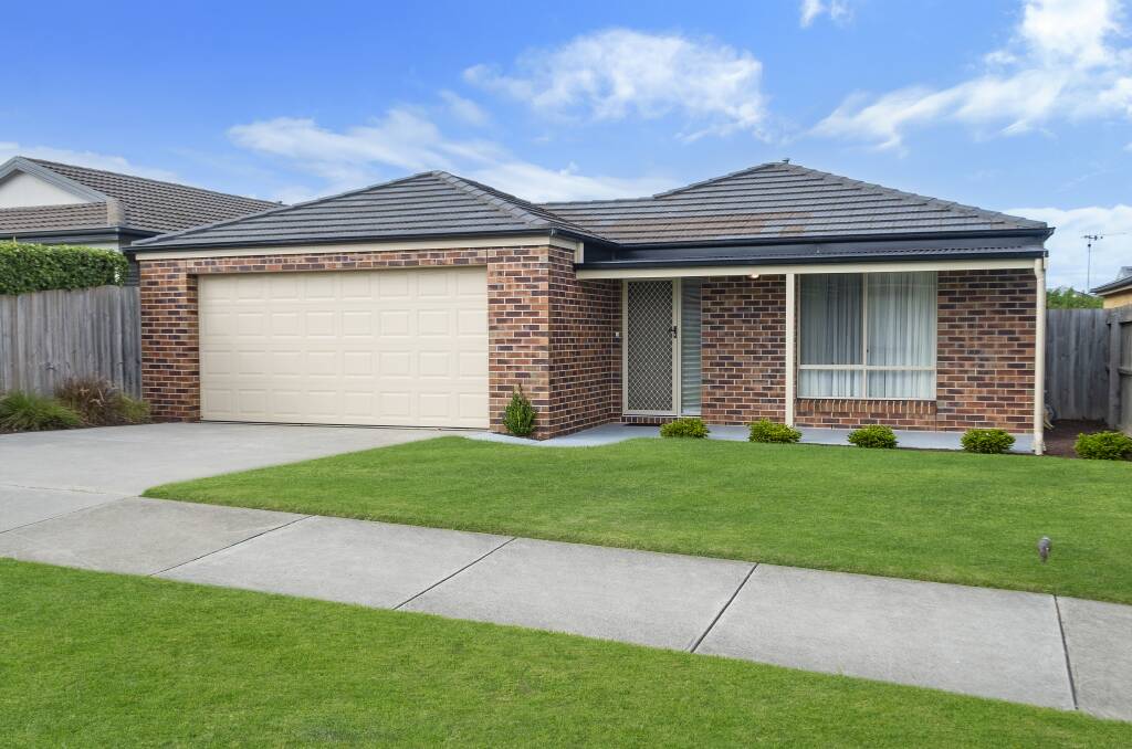 Popular: About 50 people watched on as a two-bedroom home at 12 Karen Street, Warrnambool, sold for $545,500 on Saturday. 