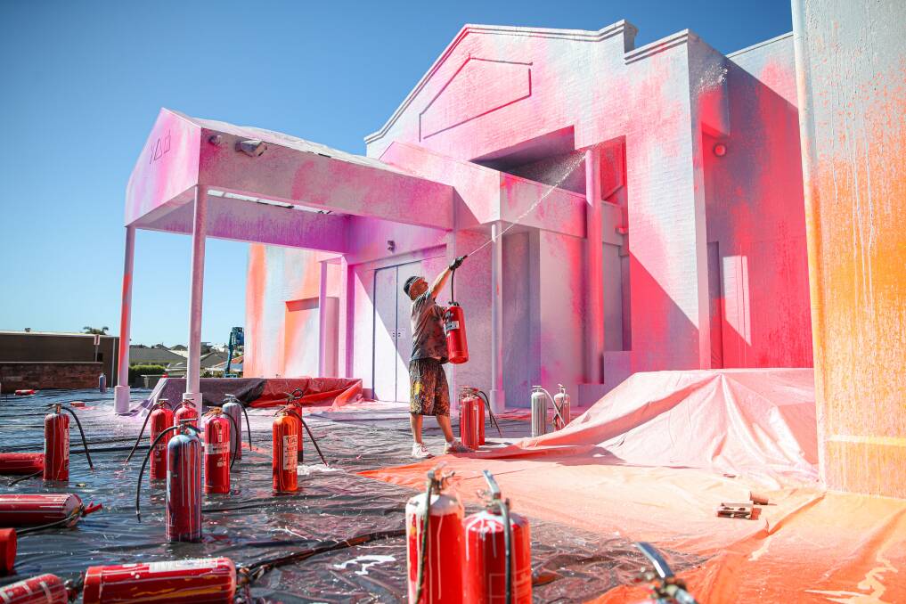 Warrnambool Art Gallery's bright sunset-inspired facade, painted by internationally-recognised artist Ash Keating in November 2021 using fire extinguishers, is being repainted white and black in a "fresh contemporary look".