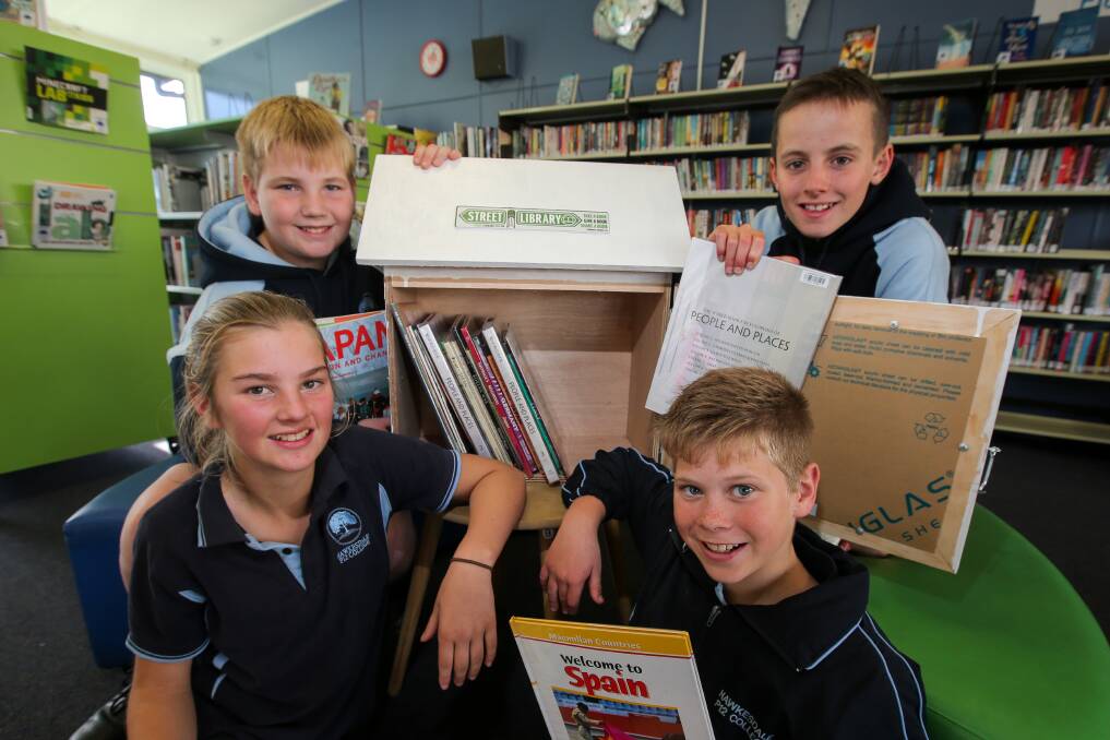 Rest and relax: Hawkesdale P-12 College year six leaders Noah Cameron, 11, Jordan Lang, 12, Tom Morrison, 12, and Max Hausler, 11, are developing a street library for residents and visitors to use at Apex Park. Picture: Rob Gunstone