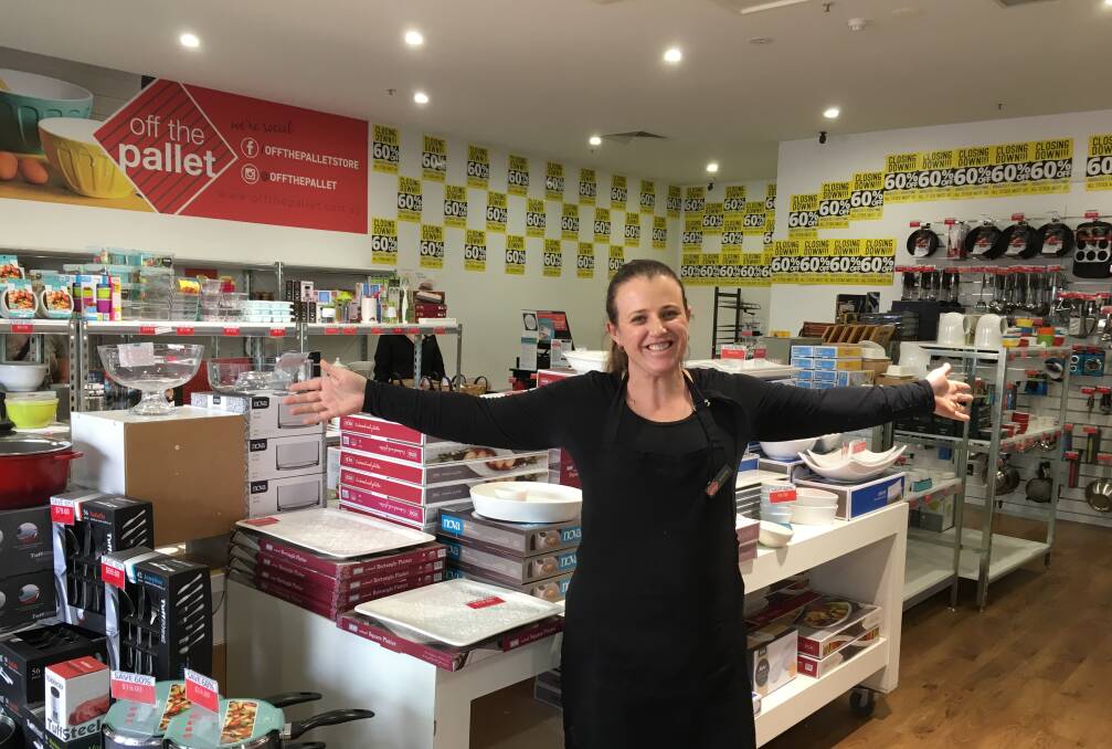 Open for business: Off the Pallet manager Amanda Ligthart is pleased the store, which was due to close on July 29, will remain open after feedback from customers. Picture: Madeleine McNeil