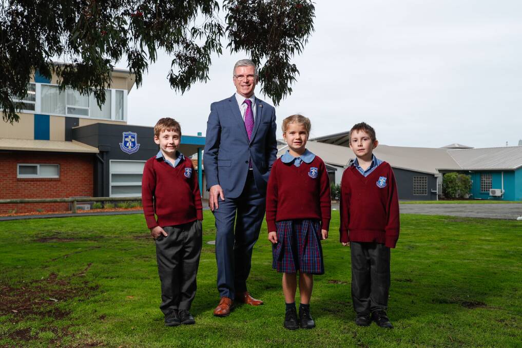 Vision: King's College principal Allister Rouse and pupils Peter Nicholls, Alina Ballinger and George Ezzy, all aged 7, are excited about plans to expand facilities as part of the college's 20 to 30-year masterplan. Picture: Chris Doheny