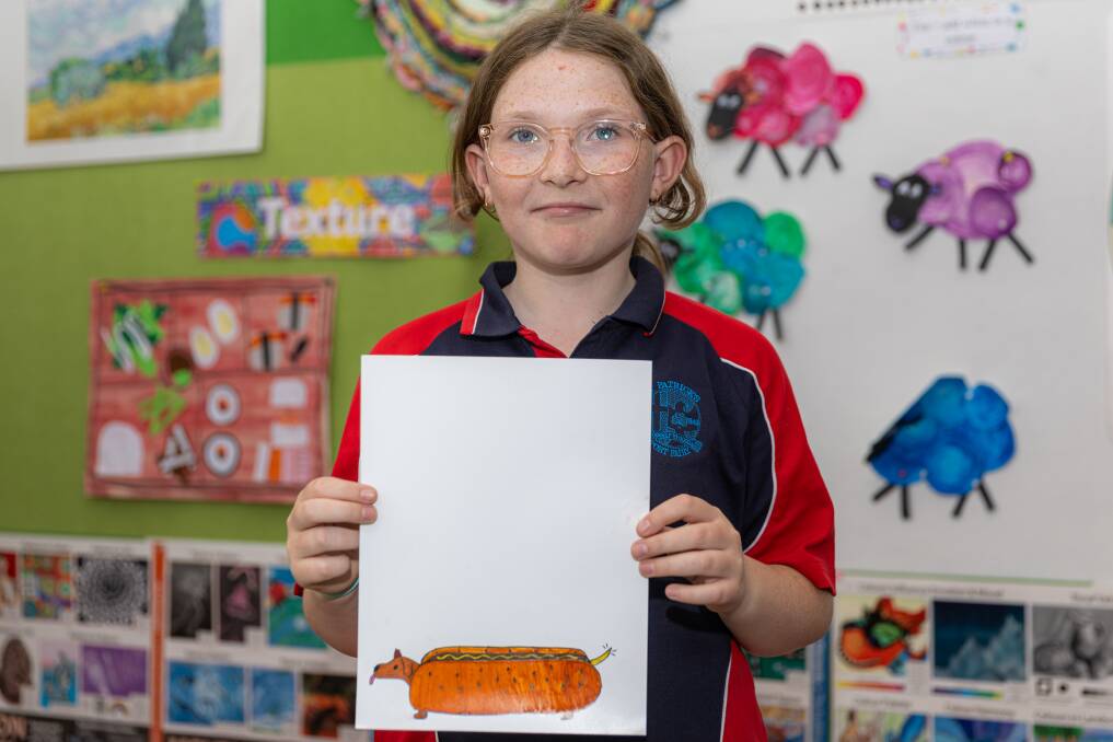 St Patrick's Parish Primary School Port Fairy student Katie Keane has won a national award for her mascot design of Sammy the Self Acceptance Sausage Dog. Picture by Eddie Guerrero