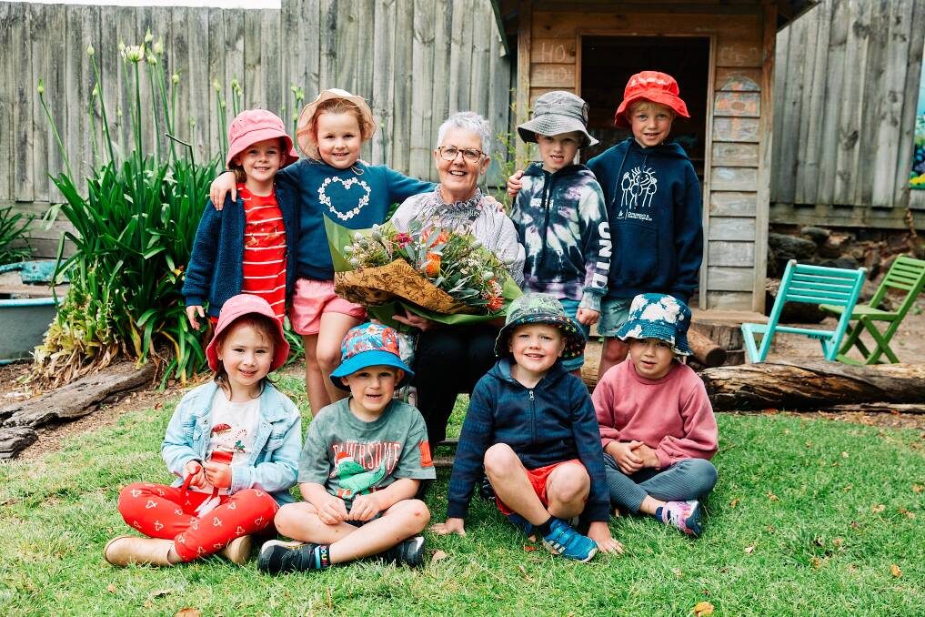 Warrnambool East Kindergarten teacher Maryanne Mills is retiring after almost 31 years. She's pictured with (back l-r) Tilly Barclay, Annie Bowman, Carter Timms, Finn Murfett, (front) Savannah DeMartin, Hayden Keane, Rafferty Lynch and Clara Tune. Picture by Warrnambool City Council