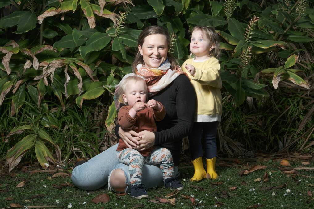 Making it work: Warrnambool's Jo Barton with daughters Willow, 2, and Daisy, 3. She was unable to return to her job as a teacher at a residential school after having Willow and now works as a casual relief teacher, and at night, due to a lack of daycare. Picture: Chris Doheny