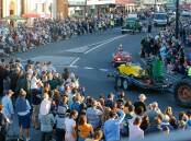 Port Fairy visitor numbers swell during the peak summer tourist season. Pictured is the annual Moyneyana Festival New Year's Eve parade which attracts a large crowd. Picture by Anthony Brady