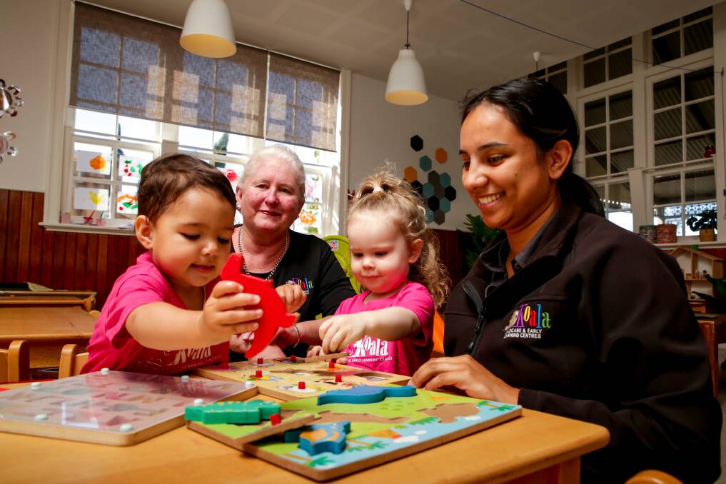 Engaged: Warrnambool's Koala Childcare and Early Learning Centre attendee Mila Ziegelaar, 1, with service manager Gill Marsden, Sadie Thomas, 2, and family relationships co-ordinator Steph Ziegelaar. Picture: Chris Doheny