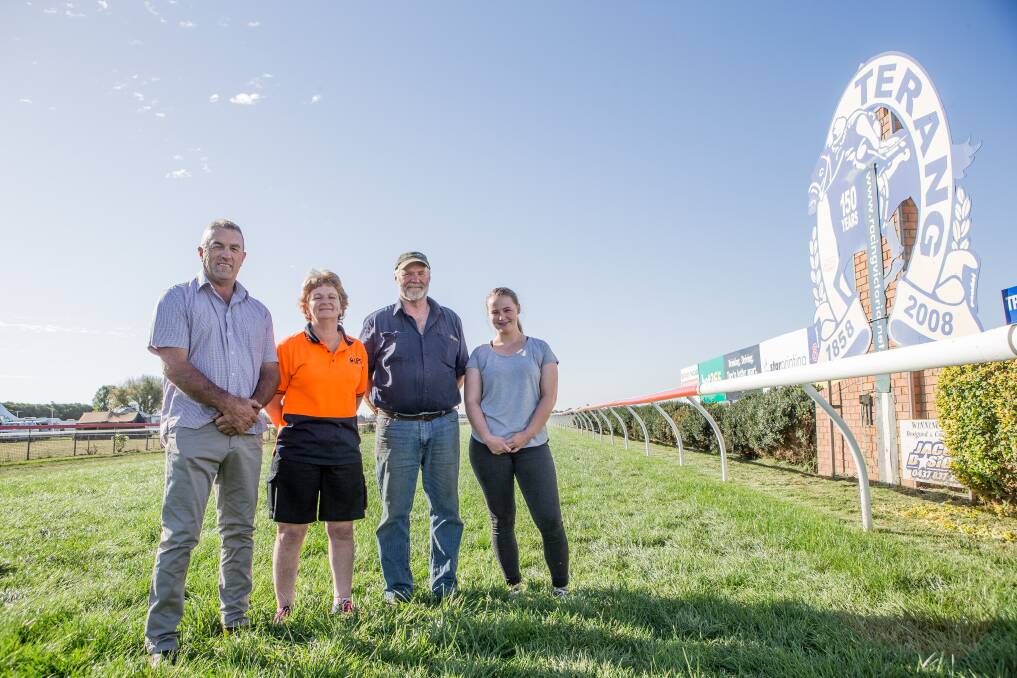 Family day: Terang and District Racing Club president Wayne Johnstone with Alison Moloney, track manager Beau Hayden and his daughter Emily Hayden at the Terang Racecourse ahead of Sunday's fire relief event. Picture: Christine Ansorge

