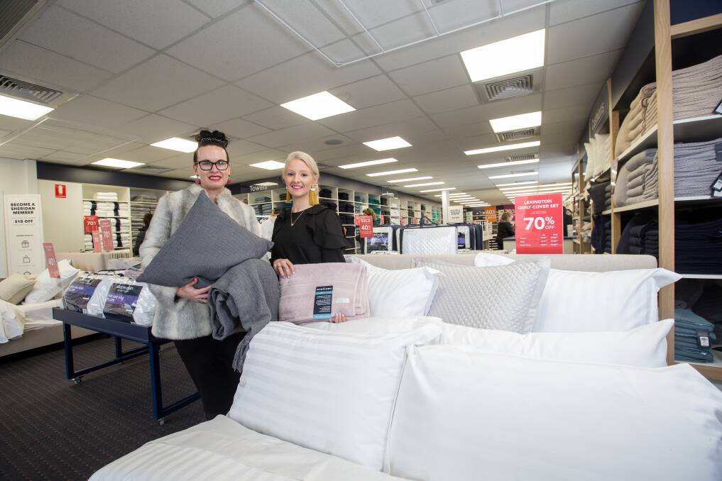 Welcome: Sheridan area manager Michelle Clear and Warrnambool store manager Jess Williamson inside the new outlet. Picture: Christine Ansorge
