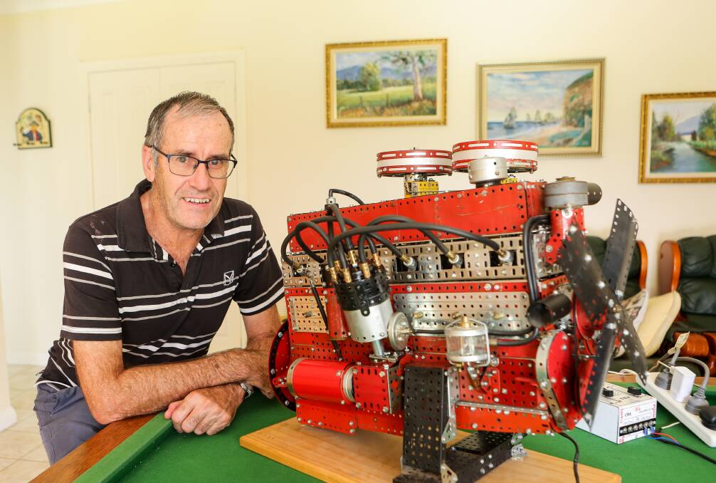 Warrnambool's Mal Brodie with a scaled electric Meccano model he built of a 186 X2 Holden engine from the late 1960s. Picture by Anthony Brady