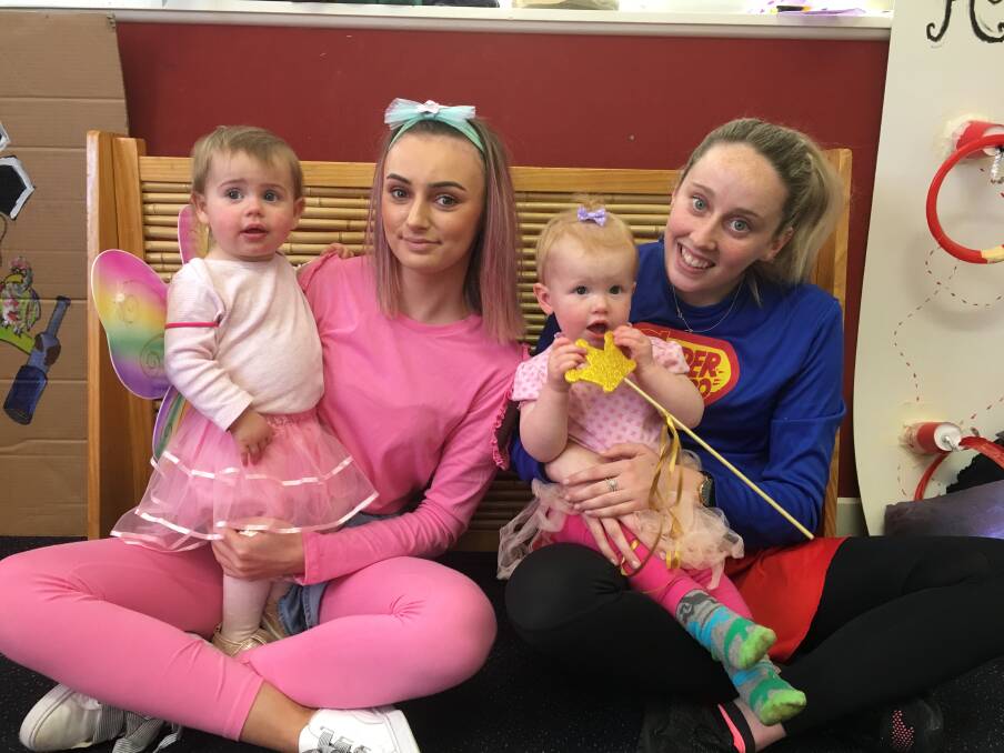 Aid: Educators Kayla Dunne and Bonnie O'Brien with Portia Dalton and Tully Brittain-Watts are helping to raise funds for a child at the centre who has leukaemia.