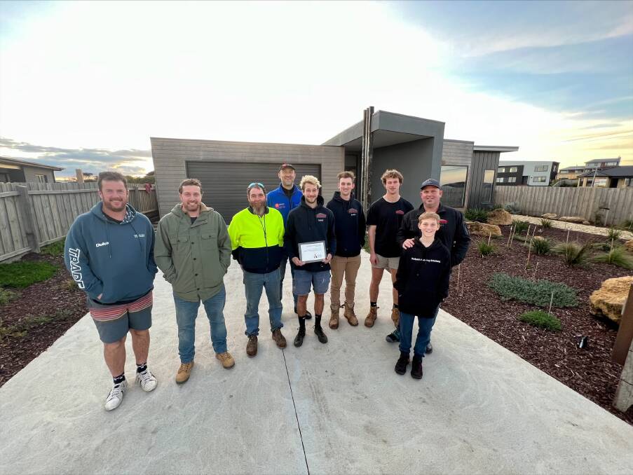 Proud: Redpath Building Solutions team members and subcontractors who worked on the Master Builders of Victoria award-winning home Glen Savage, Leigh Savage, John Knox, Michal Forynski, Isaac Welsh, Justin Turner, Jonas Welsh, Bart Redpath and Angus Redpath.