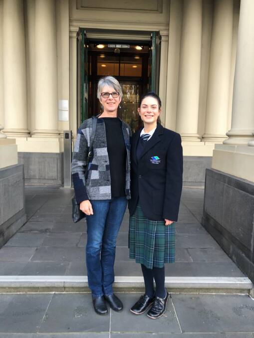 Winner: Warrnambool College year 12 student Susan Malikoff, with her mum Jenny, at the VCAA Plain English Speaking Award state semi final in Melbourne. She will compete in the state final on July 25. 
