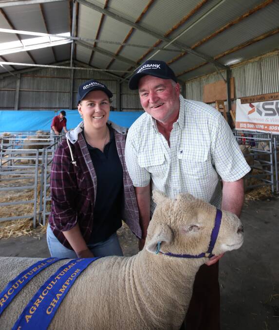 Winner: Madeline Brooks and Pete McDonald with their southdown champion ram at the 2016 Koroit event. The show is on Saturday at Victoria Park. Gates open at 9am. 
