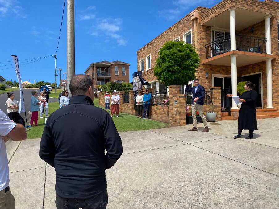 Warrnambool's Danny Harris from Harris & Wood auctions 9 Wentworth Street on Saturday in front of a crowd of about 30 people. Picture by Madeleine McNeil