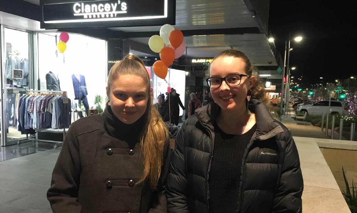 Girls go shopping: Alison Boylan-Turner and Holli Agnew made the most of late night shopping and checked out what was in store on Friday evening as retailers stayed open until 8pm. Picture: Madeleine McNeil