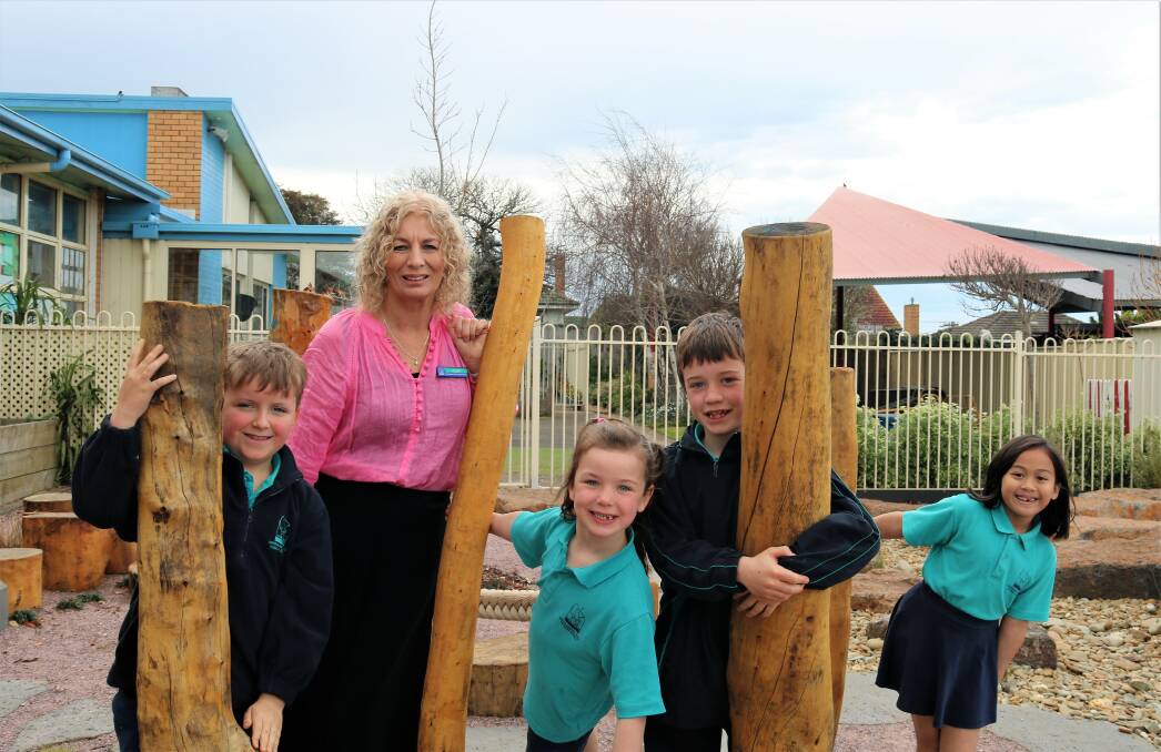 Warrnambool West Primary School principal Clare Monk is the 2023 Victorian Education Excellence Awards outstanding primary principal. She is pictured with students Harry Mitchell, Molly McColl, Hamish McColl and Paige Gemao. Picture supplied