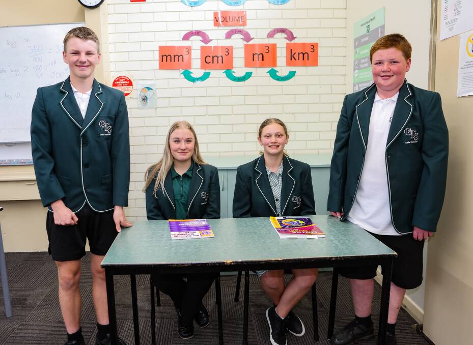 Students Bradey Fratantaro, Imogen Eddy, Marli Phillips and Seth Meade celebrate Cobden Technical School being named in the top 10 most improved regional secondary schools for NAPLAN results in Victoria. Picture by Anthony Brady