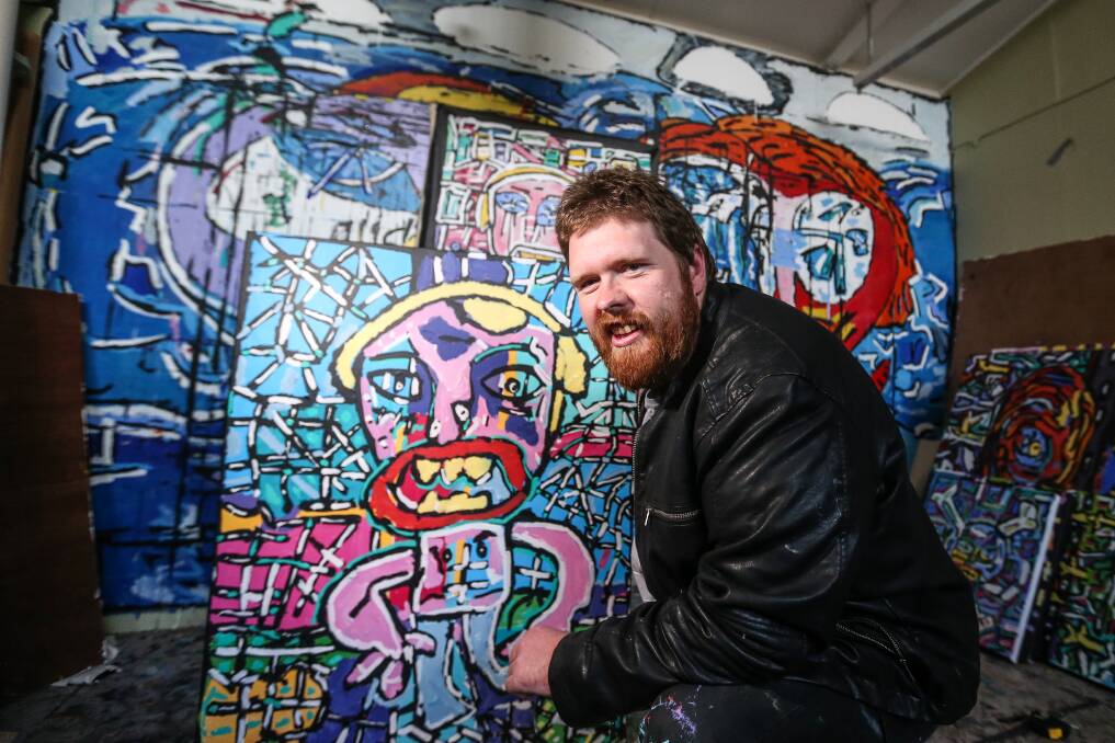 Bright spark: Kirkstall artist Matthew Clarke's artwork featured on the Adelaide Fringe Festival program and other promotional material. He is looking forward to another busy year ahead. Picture: Anthony Brady
