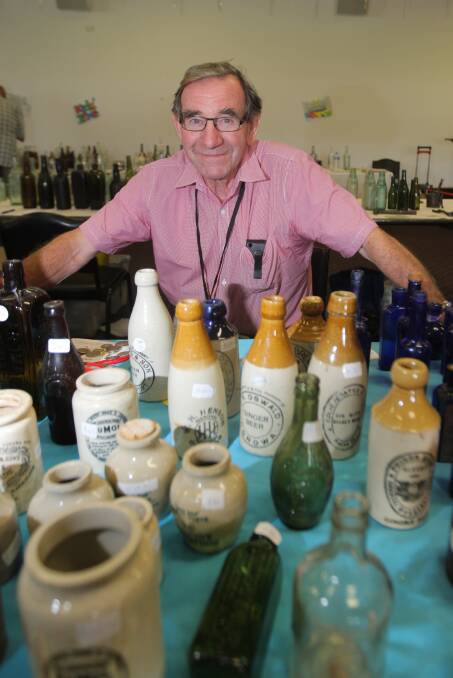 Relic: Ross Roycroft, who has been collecting bottles for almost 50 years, at the South West Bottle and Collectables Show in Warrnambool. The event is on again this weekend. Picture: Morgan Hancock
