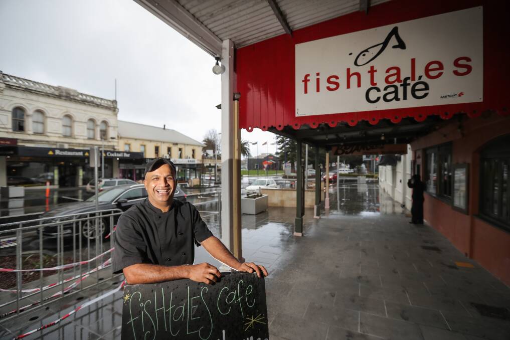Come in: Fishtales chef Jayaweera Bandara is looking forward to welcoming customers back as the southern end of Liebig Street reopens to traffic. Picture: Morgan Hancock

