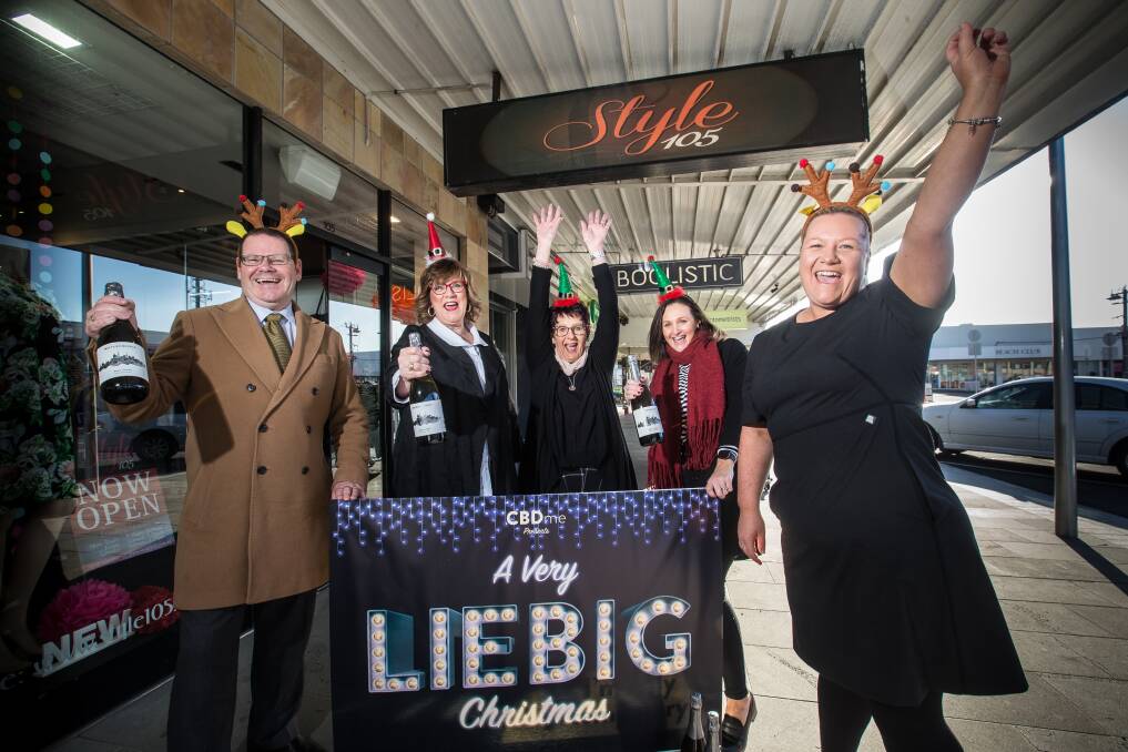 Party time: Liebig Street traders Vince Haberfield, Debbie Arnott, Maree Wills, Renee Roberts and Adele Griffin want the community to come and enjoy Christmas festivities in a new event on November 30. Picture: Christine Ansorge

