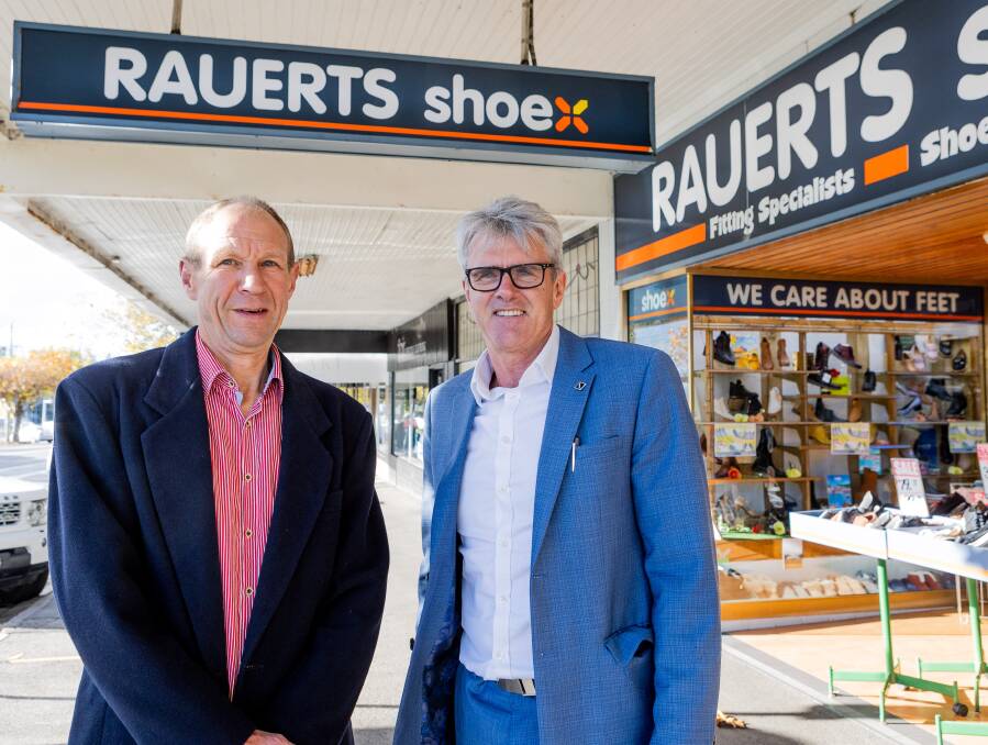Family business Rauerts Shoex has been operating in the city for more than 70 years. Its owner Peter Rauert is retiring, listing the business for sale with Ludeman Real Estate agent Nigel Kol. Picture by Anthony Brady