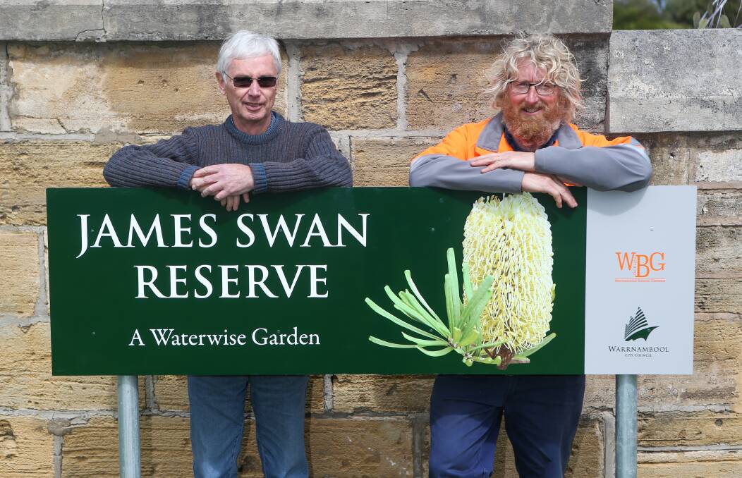New link: Friends of Swan Reserve president Kevin Sparrow and Warrnambool Botanic Gardens curator John Sheely  with one of the new signs at Swan Reserve to help lift its profile. Picture: Morgan Hancock