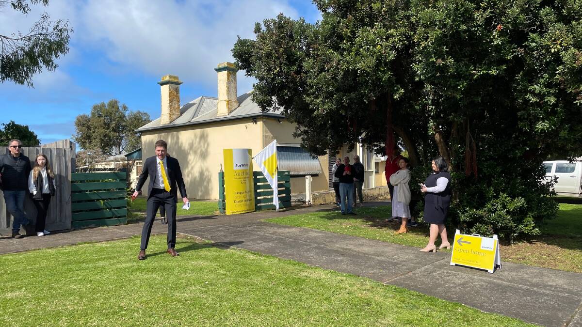 Ray White Warrnambool auctioneer Fergus Torpy at 18 Ryot Street which sold for $625,000. Picture by Madeleine McNeil