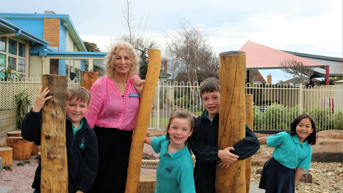 Warrnambool West Primary School principal Clare Monk has won the Victorian Education Excellence Awards outstanding primary principal at a ceremony in Melbourne on Friday night. She is pictured with students Harry Mitchell, Molly McColl, Hamish McColl and Paige Gemao. Picture supplied