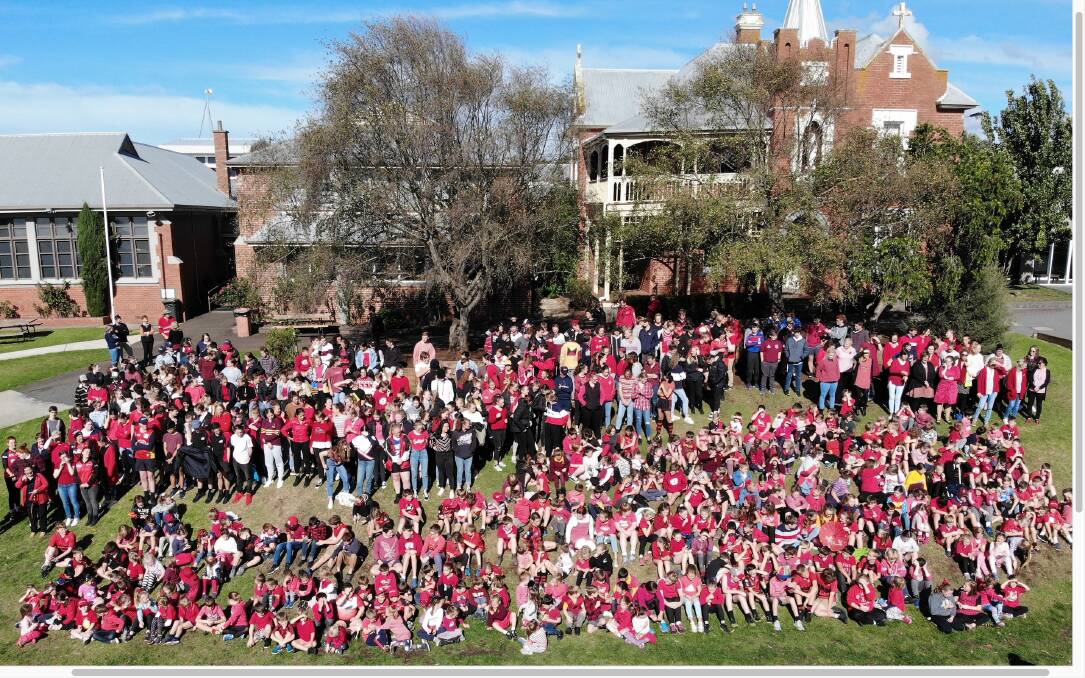 A touch of red: Schools across the Corangamite Shire, including Mercy Regional College's McAuley Campus and St Patrick's Primary School Camperdown pictured here, wore red on Friday to show support for Powell family and the Port Campbell community. 