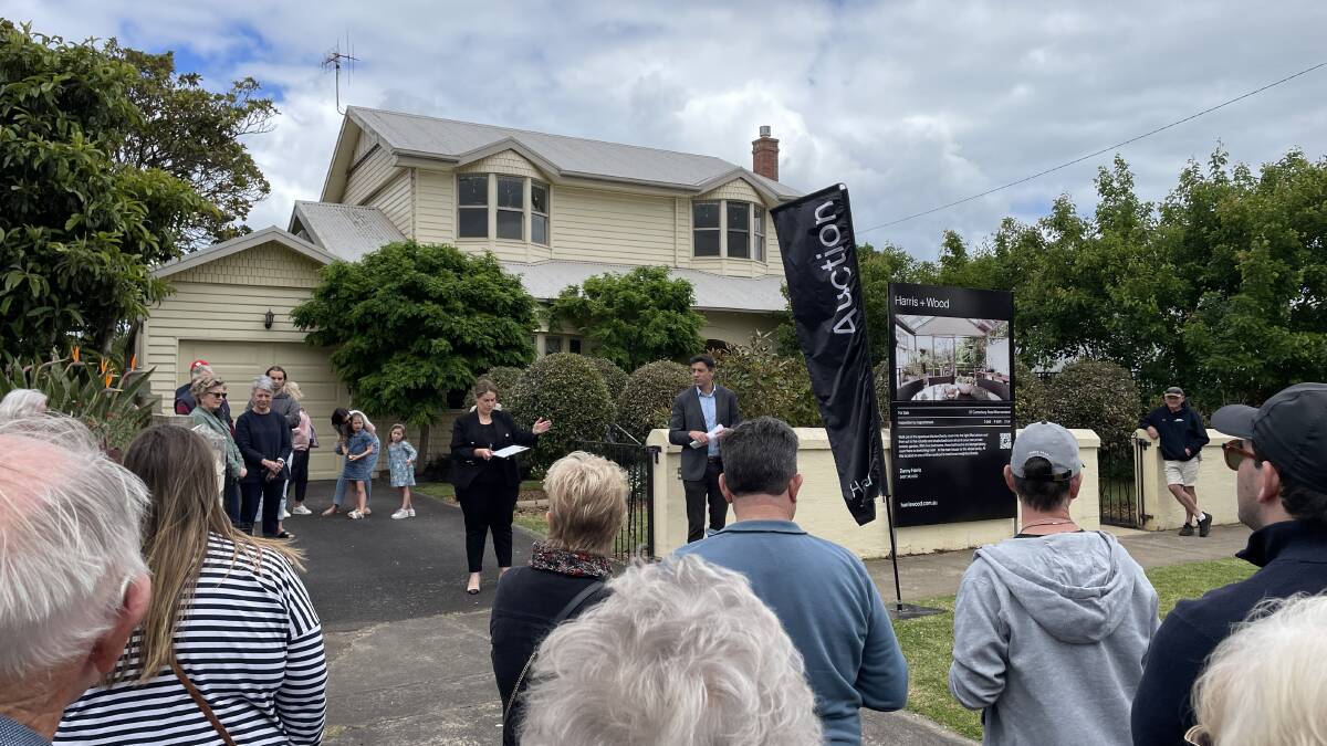 Harris & Wood Real Estate auctioneer Danny Harris at 57 Canterbury Road in Warrnambool on Saturday, October 21, 2023. It sold for $1.140 million. Picture by Madeleine McNeil