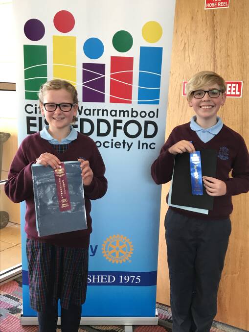 Awards: Port Fairy's St Patrick's Primary School students Lily Godde, 11 and Ted Kelly, 12, received prizes at the Warrnambool Eisteddfod on Monday.