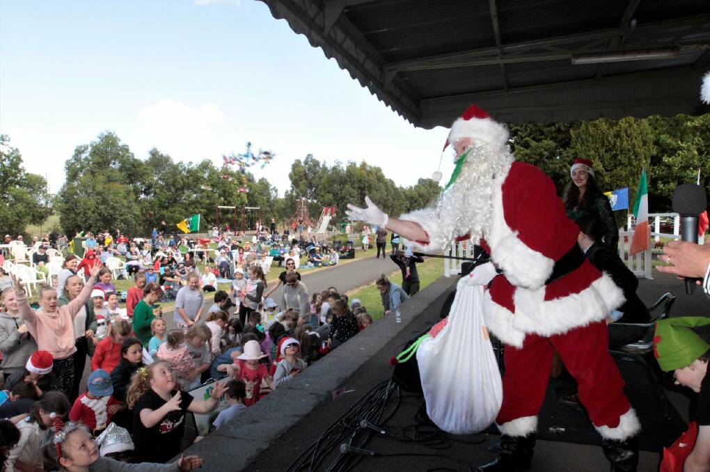 Popular: Santa makes an appearance at the Koroit Carols by the Railway. This year's Santa will be Irish and wear a green suit, in a nod to the town's Irish heritage.