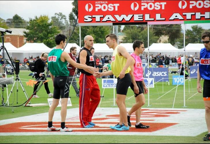 Fast: Stawell Gift winner Luke Versace congratulates his fellow competitors. Luke will try his luck as a contestant in the festival's Big Fat Irish Pizza Competition.